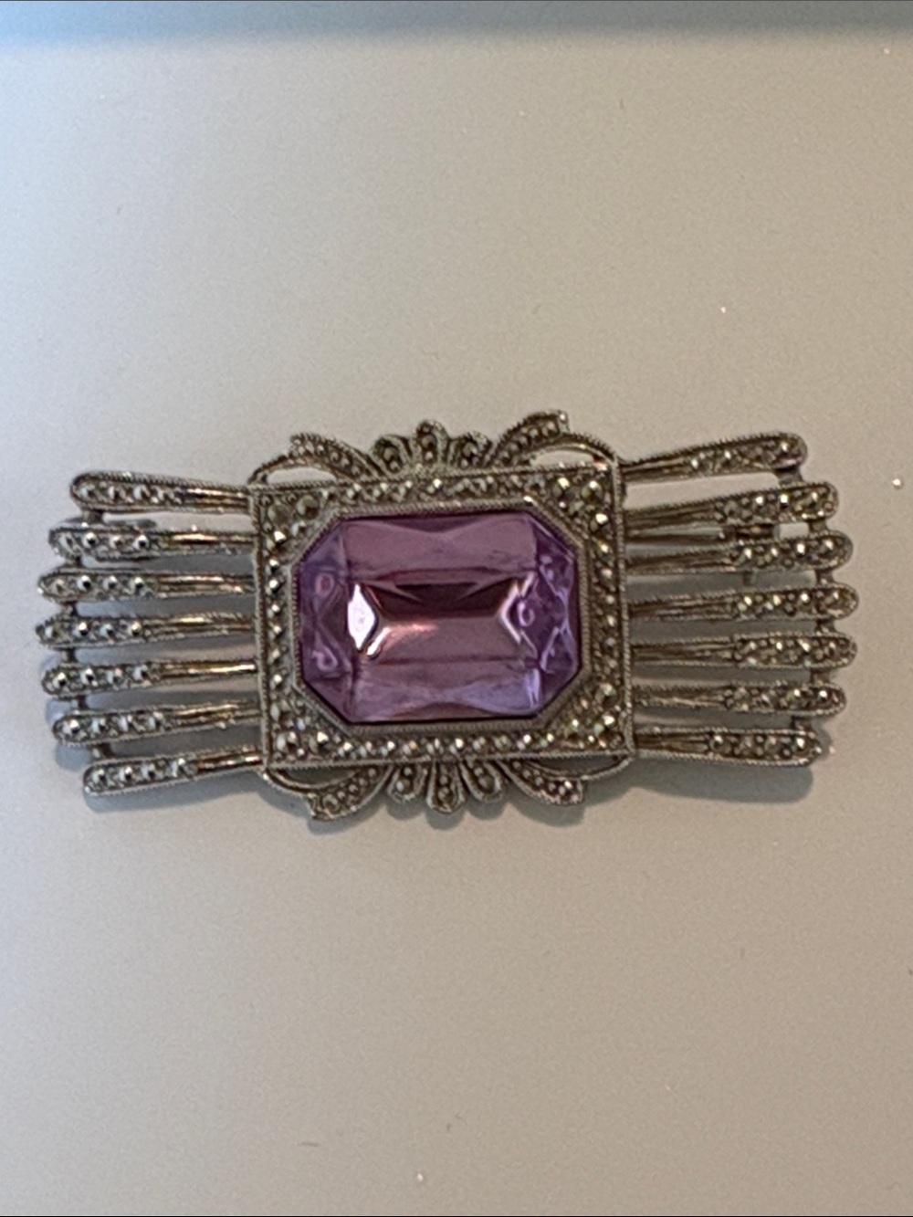 1928 silver tone brooch